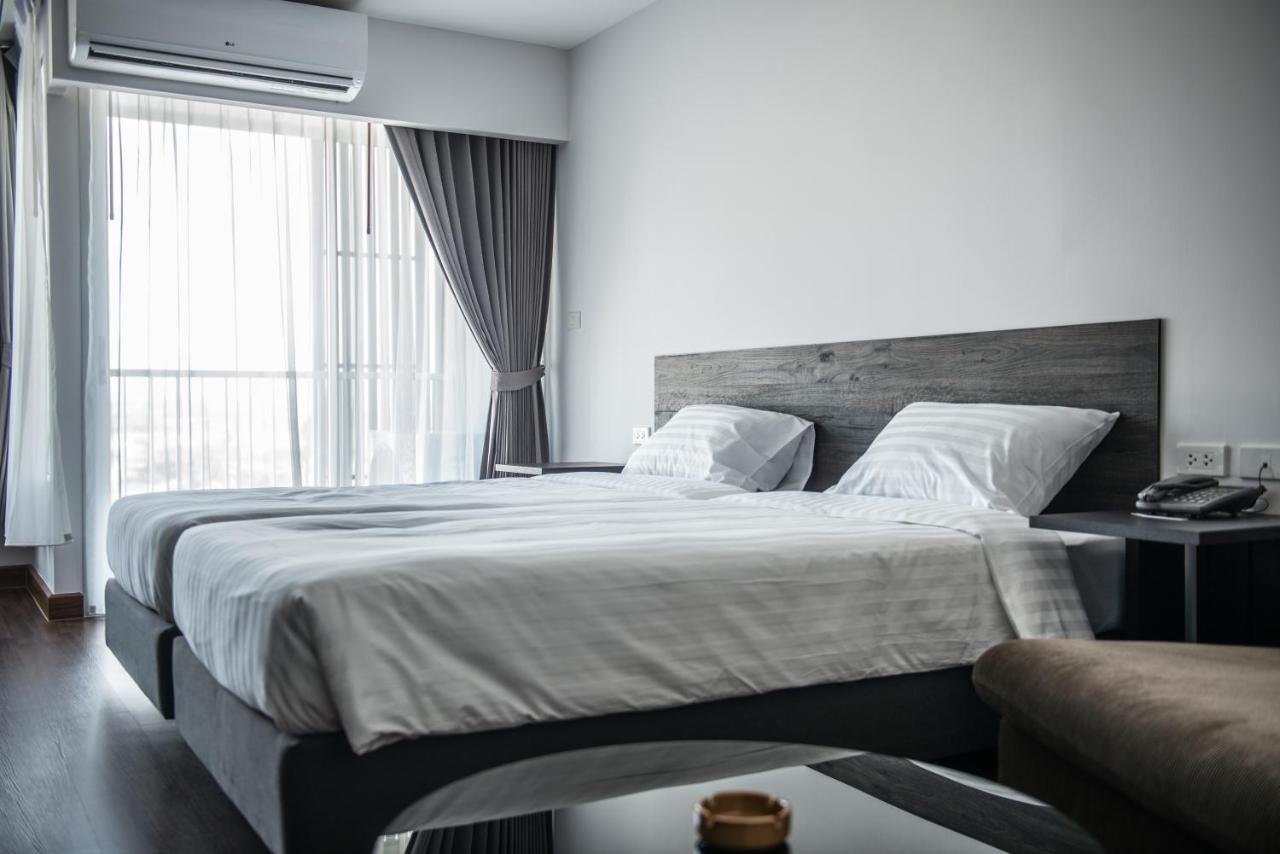 Winner Sriracha Serviced Apartment Сирача Экстерьер фото